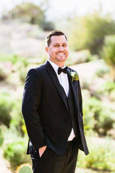 Groom's black tux with bowtie for his Troon North wedding by PMA Photography.