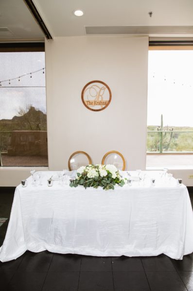 Sweetheart table at Troon North wedding reception by Arizona wedding photographer PMA Photography.