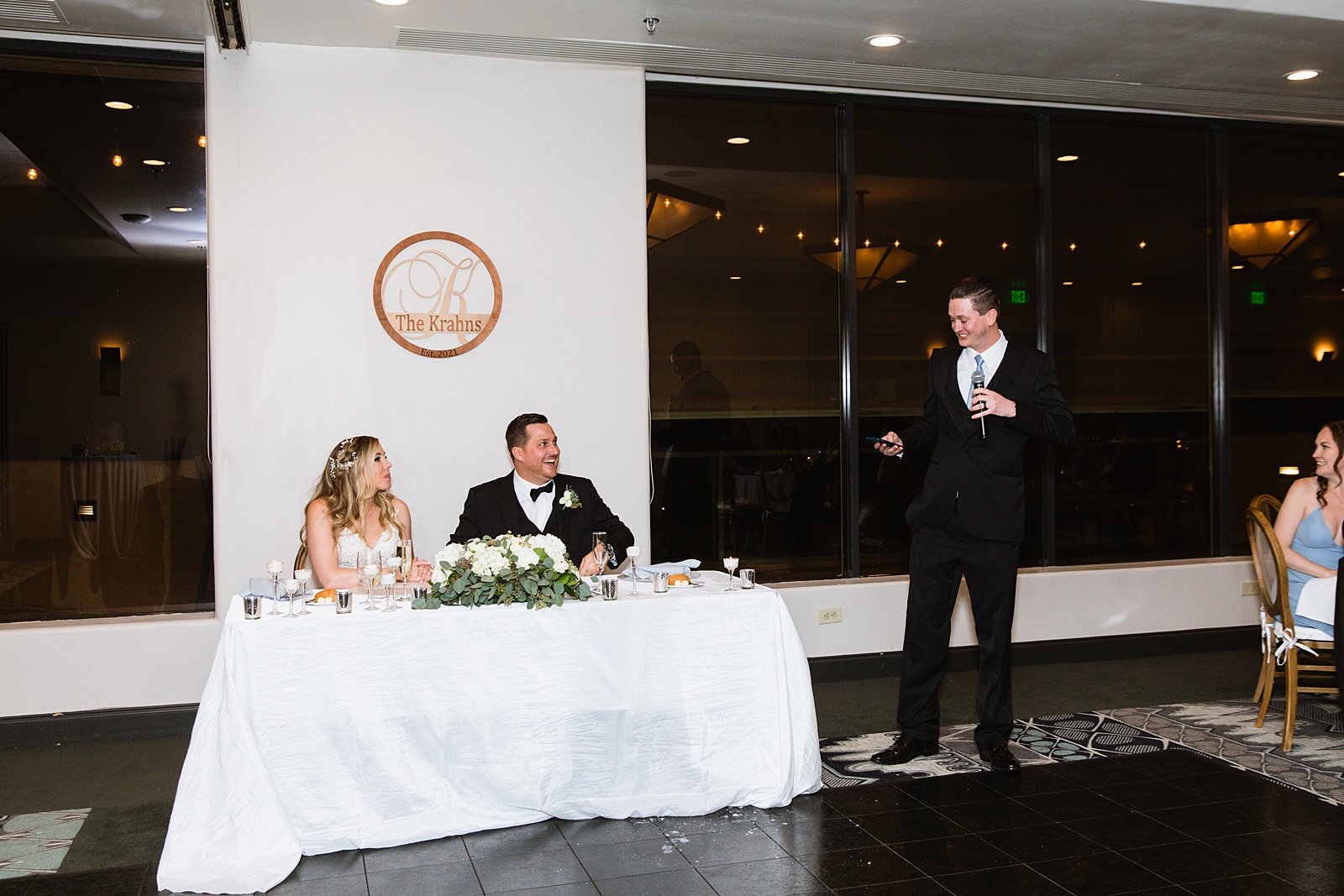 Toasts at Troon North wedding reception by Scottsdale wedding photographer PMA Photography.