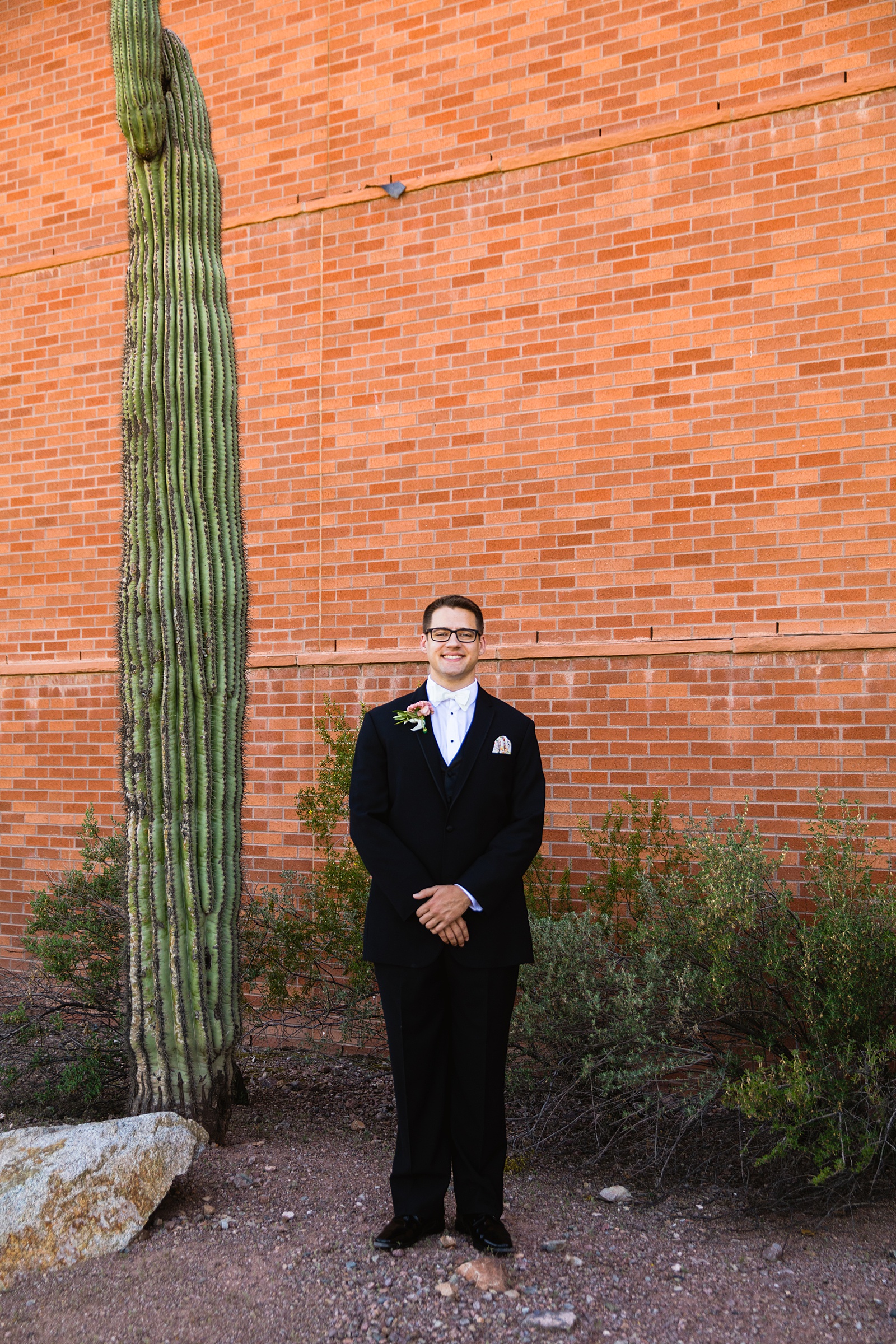 Groom's classic black suit for his Arizona Historical Society wedding by PMA Photography.