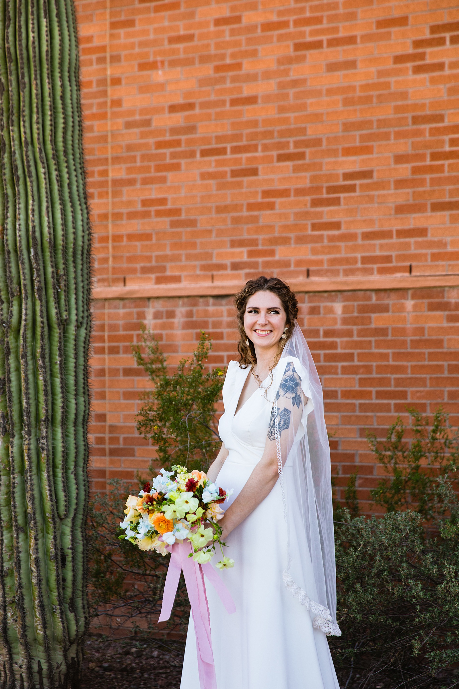 Bride's handmade wedding dress for her Arizona Historical Society wedding by PMA Photography.