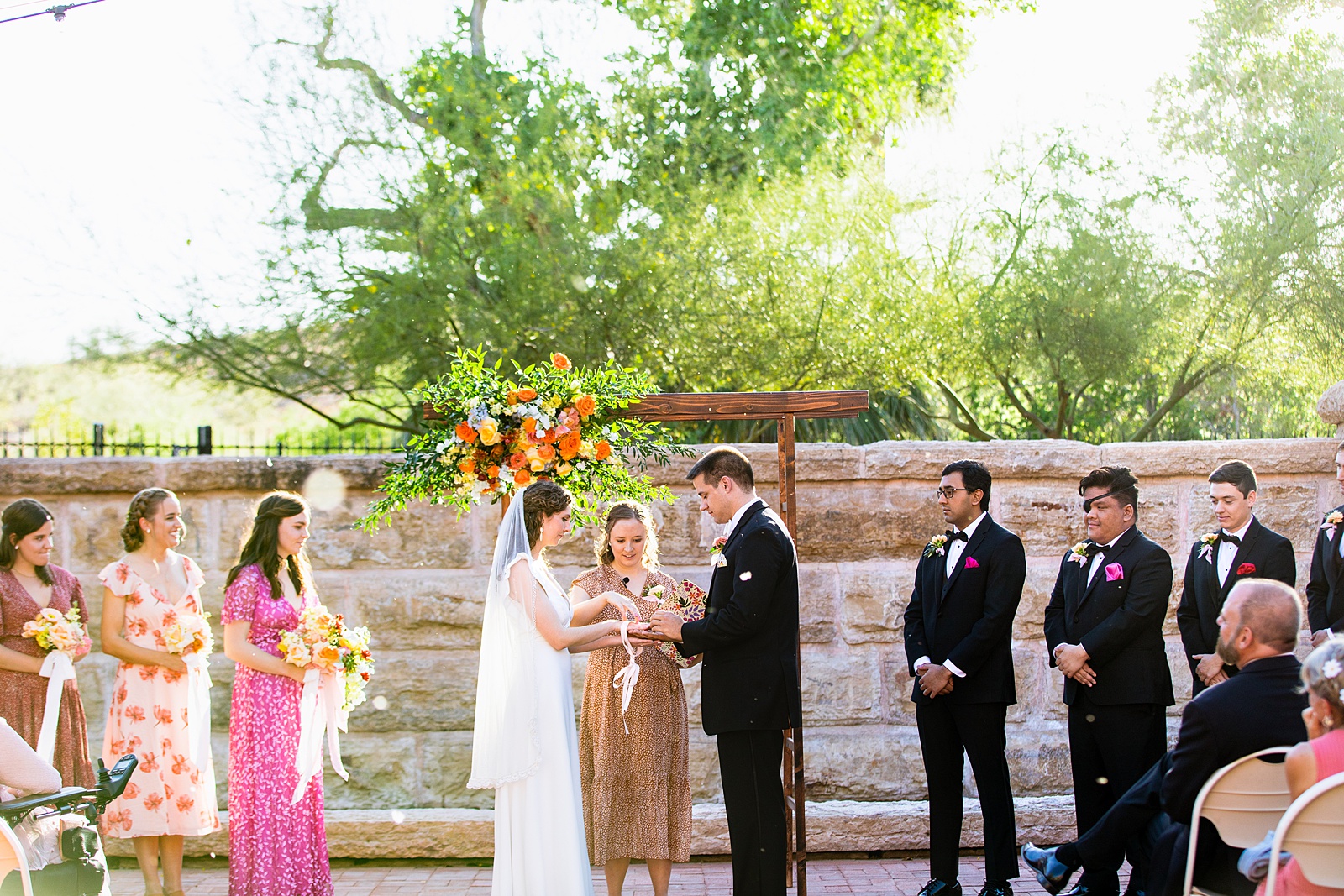 Bride and groom together during Arizona Historical Society wedding ceremony by Tempe wedding photographer PMA Photography.