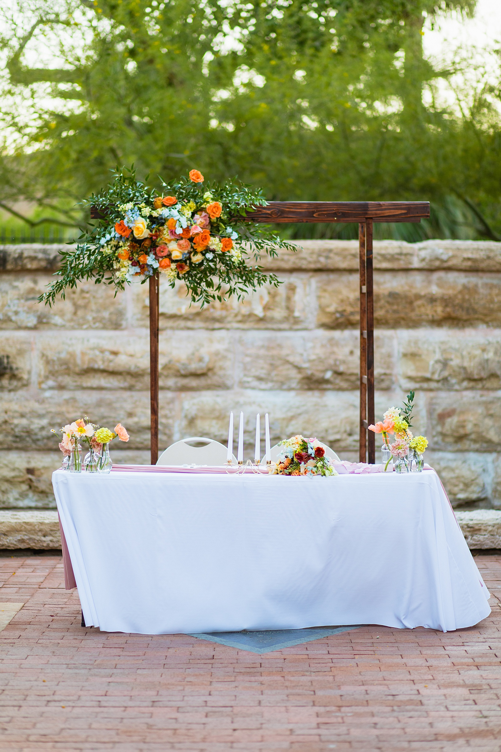 Sweetheart table at Arizona Historical Society wedding reception by Arizona wedding photographer PMA Photography.