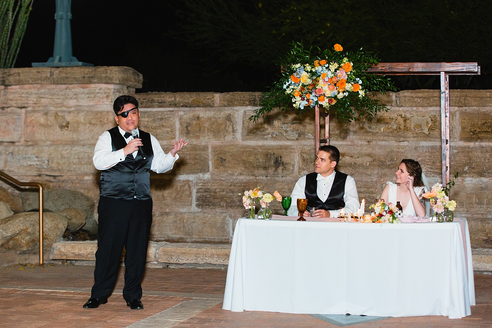 Toasts at Arizona Historical Society wedding reception by Tempe wedding photographer PMA Photography.