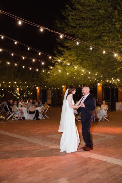 Bride dancing with her father at Arizona Historical Society wedding reception by Tempe wedding photographer PMA Photography
