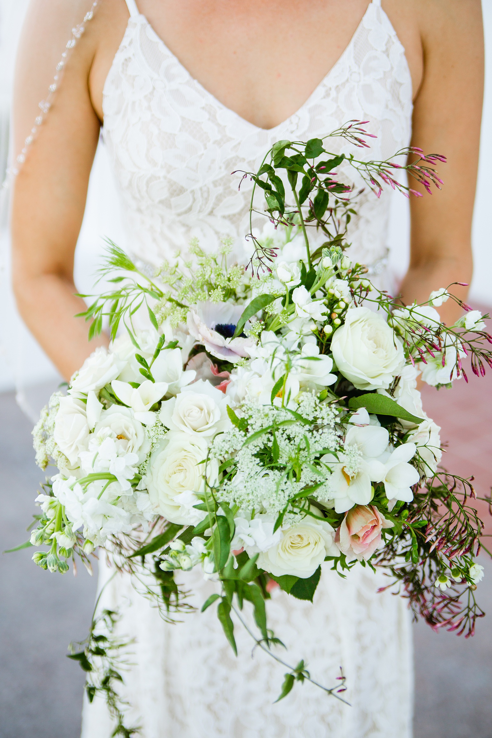 Bride's white wild garden bouquet by PMA Photography.