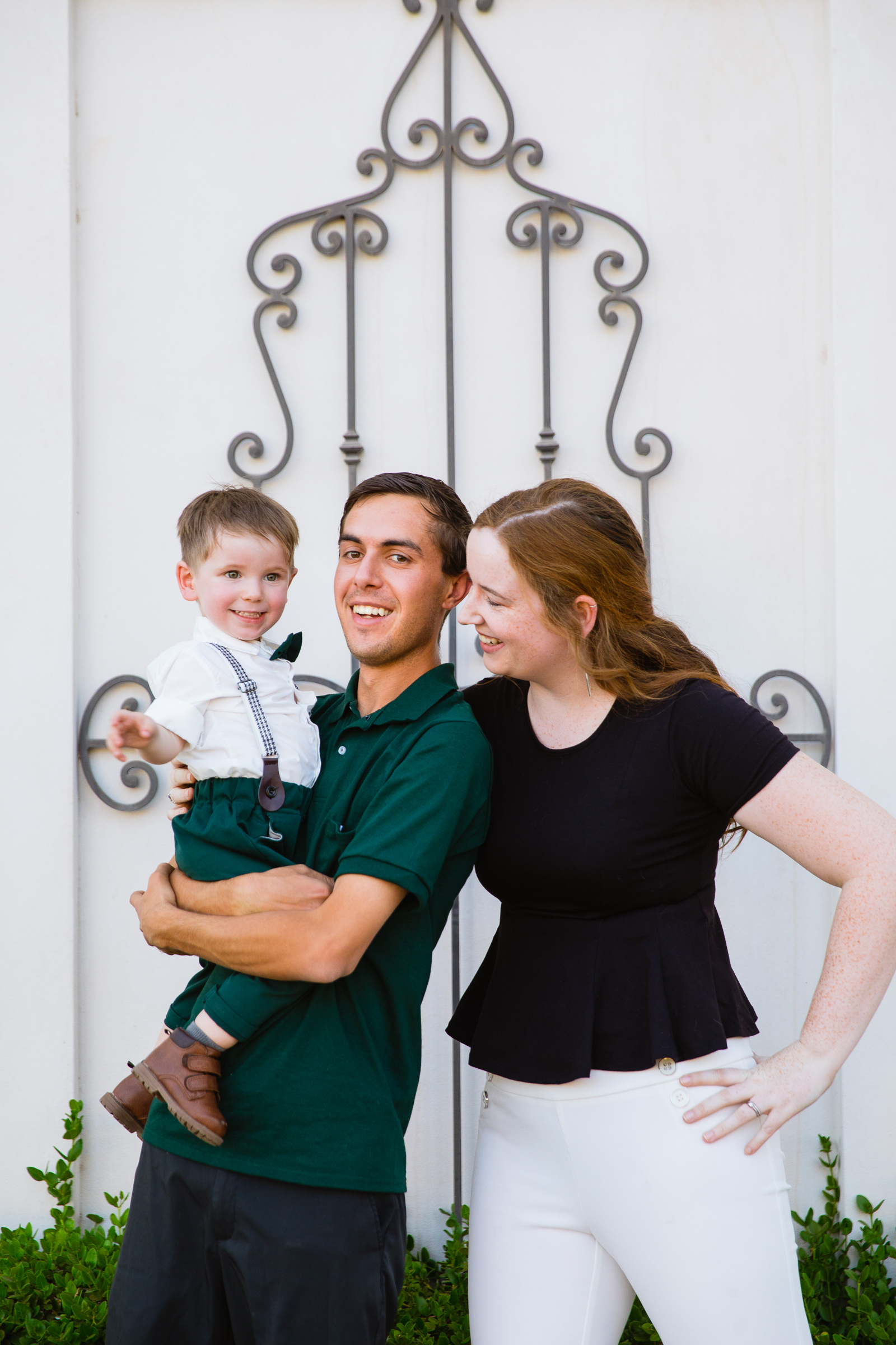 Family laughing together during their Verrado family session by Arizona family photographer PMA Photography.