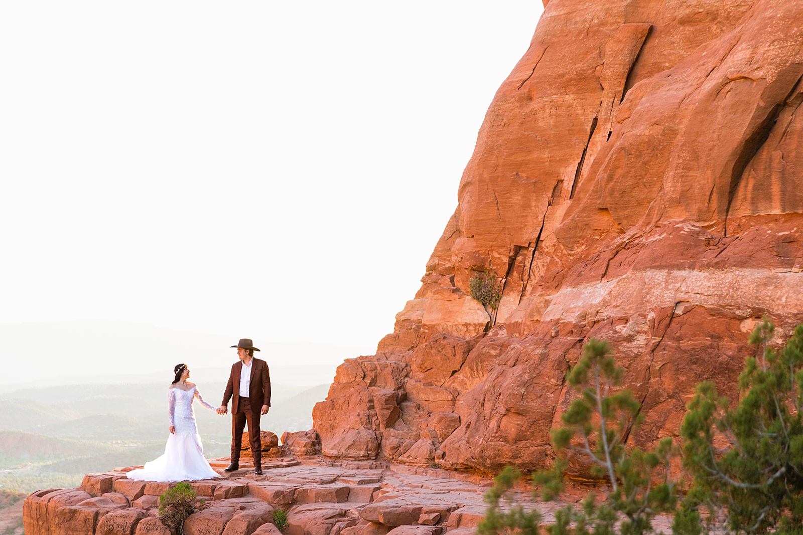 Bride and Groom pose for their Cathedral Rock elopement by Sedona elopement photographer PMA Photography.
