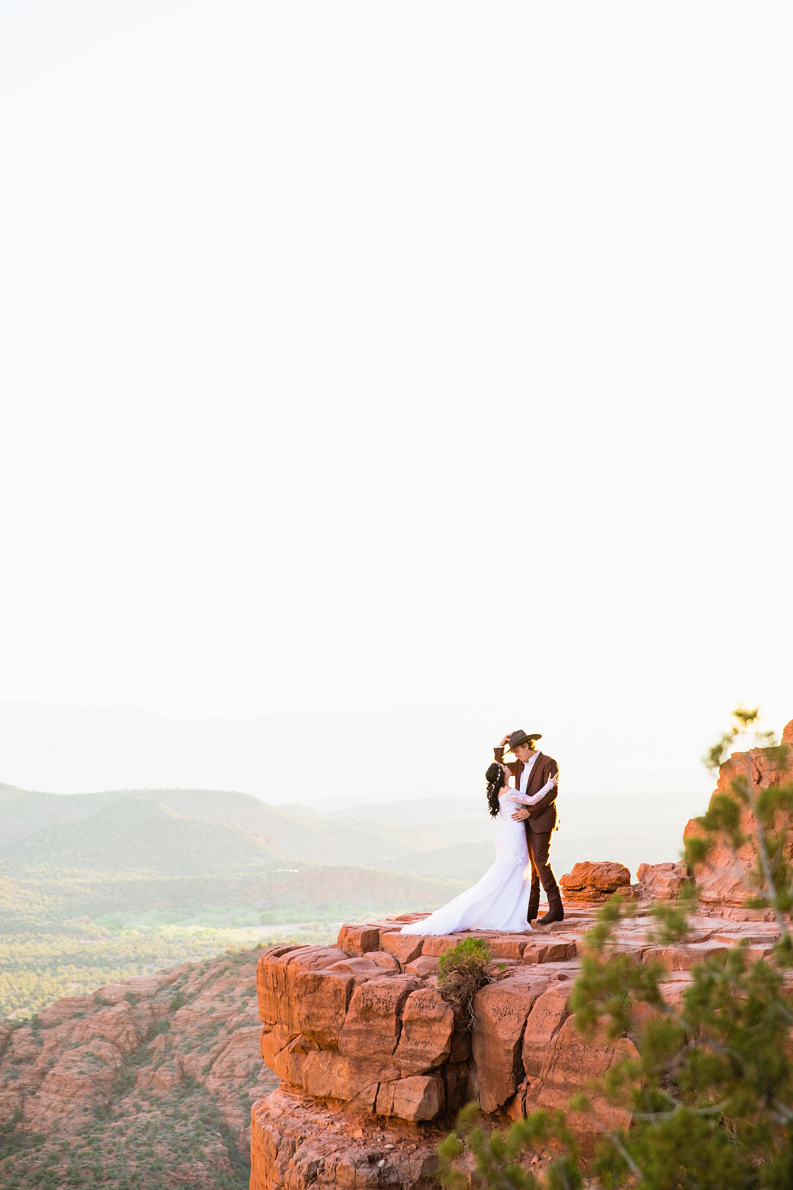 Bride and Groom share an intimate moment during their Cathedral Rock elopement by Sedona elopement photographer PMA Photography.