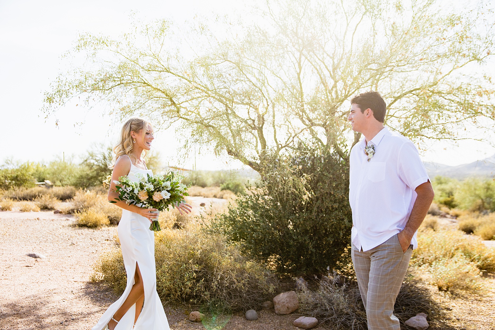 Bride and Groom's first look at Superstition Mountain Micro by Phoenix wedding photographer PMA Photography.
