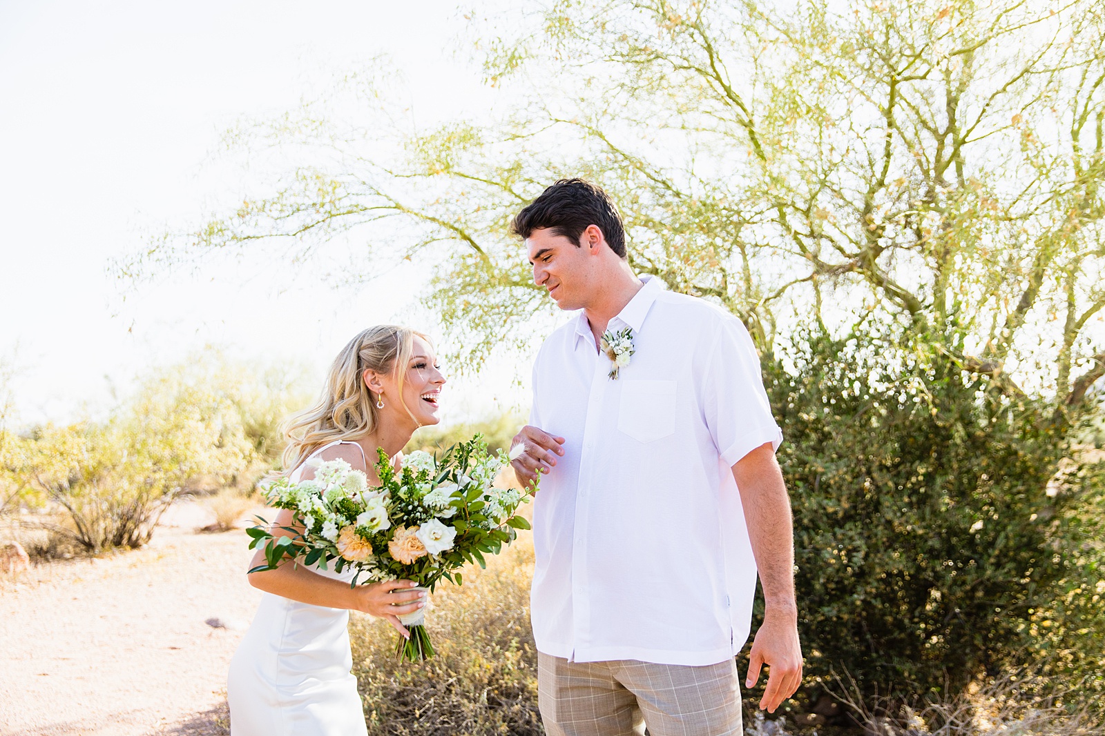 Bride and Groom's first look at Superstition Mountain Micro by Phoenix wedding photographer PMA Photography.