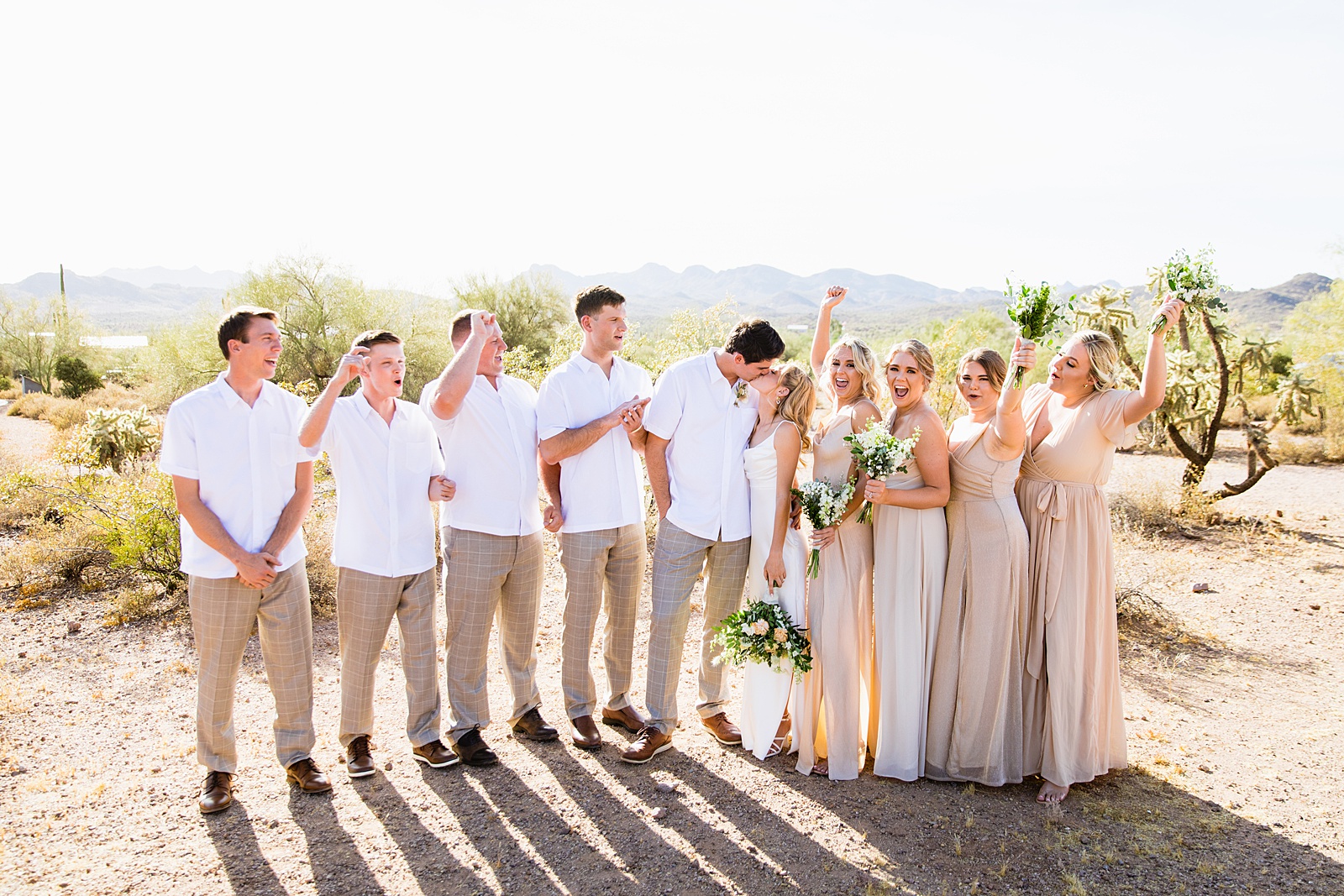 Bridal party laughing together at Superstition Mountain Micro wedding by Lost Dutchman wedding photographer PMA Photography.