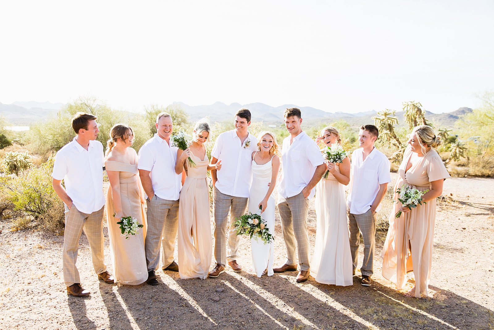 Bridal party laughing together at Superstition Mountain Micro wedding by Lost Dutchman wedding photographer PMA Photography.