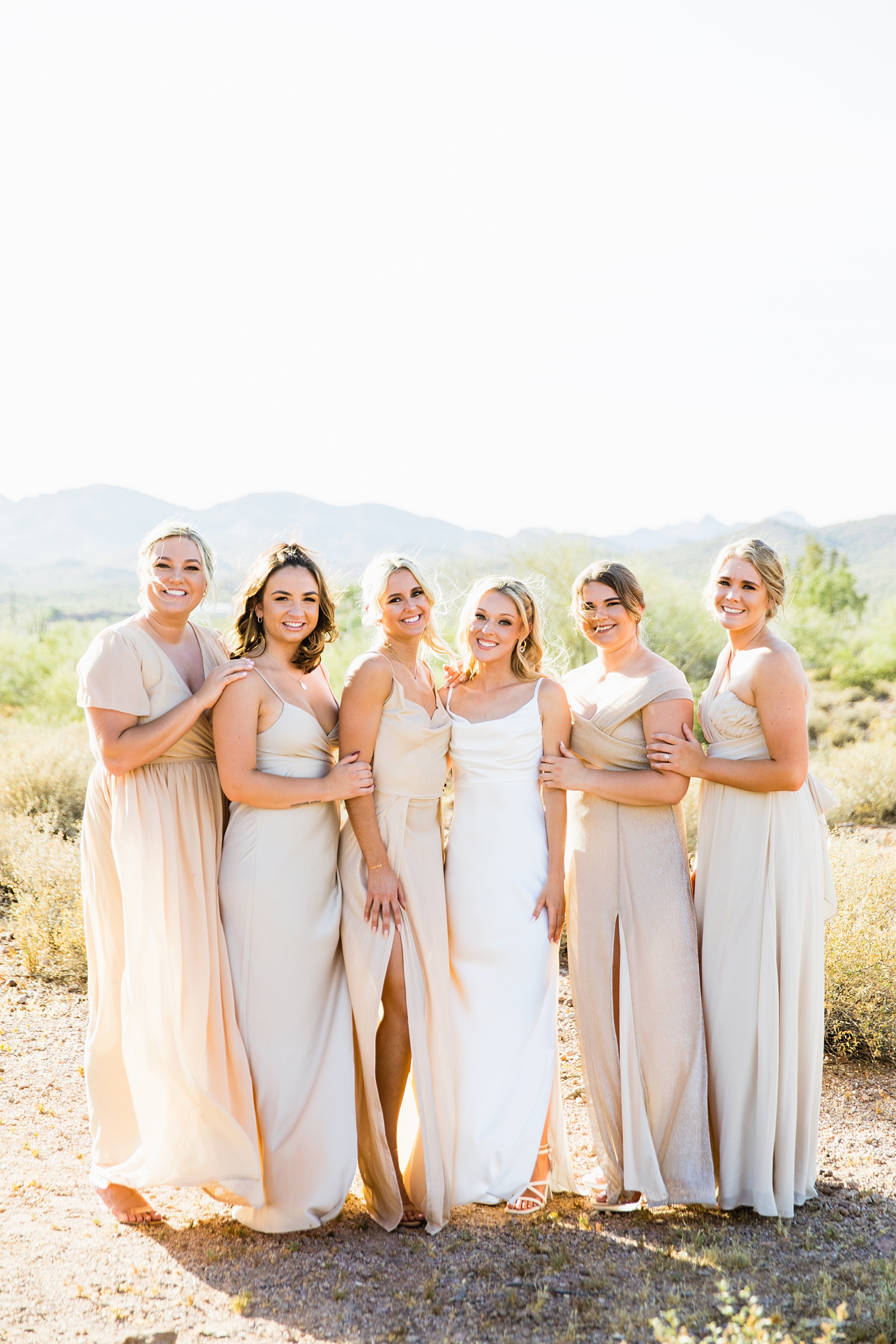 Bride and bridesmaids together at a Superstition Mountain Micro wedding by Arizona wedding photographer PMA Photography.
