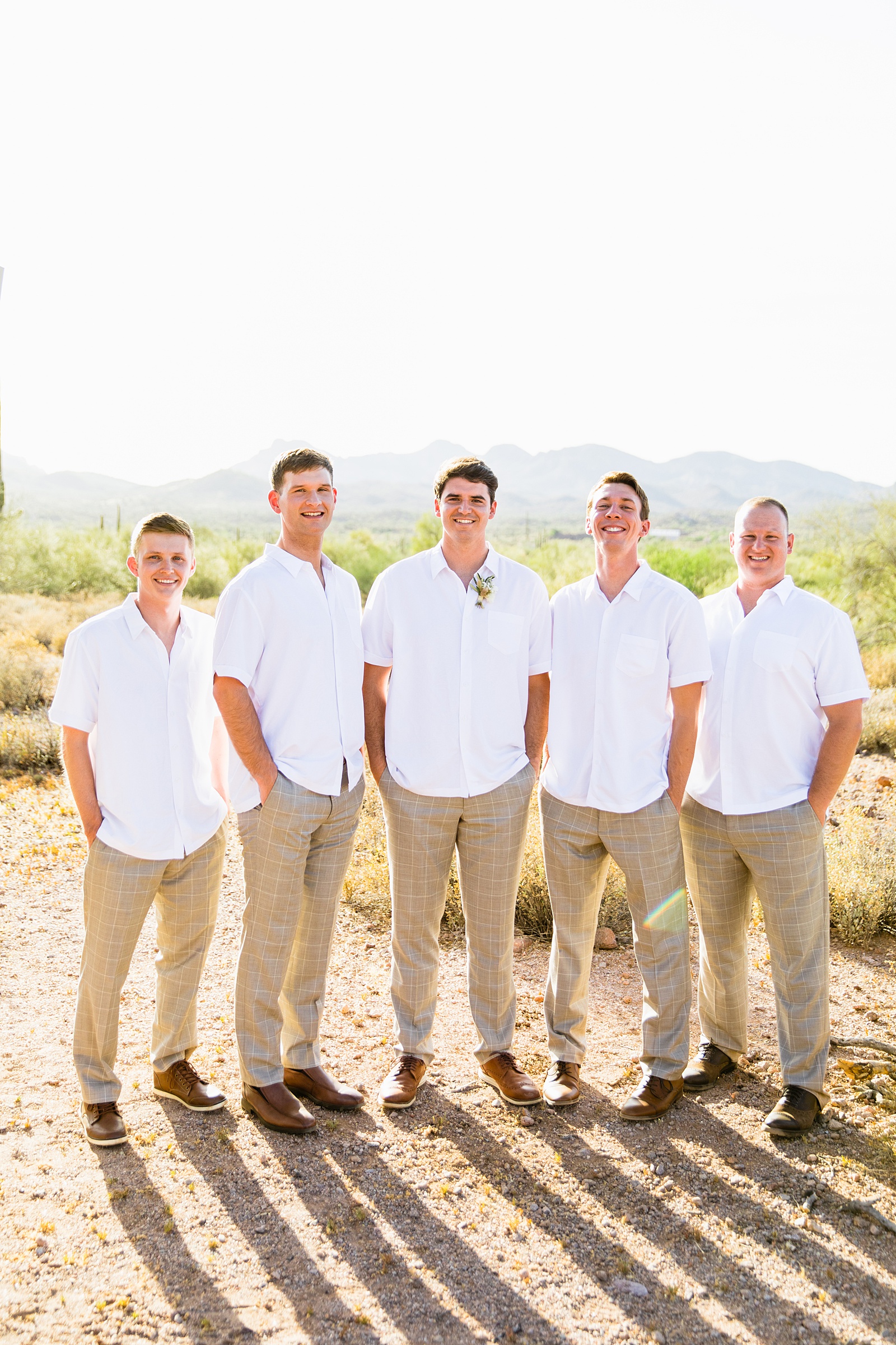 Groom and groomsmen together at a Superstition Mountain Micro wedding by Arizona wedding photographer PMA Photography.