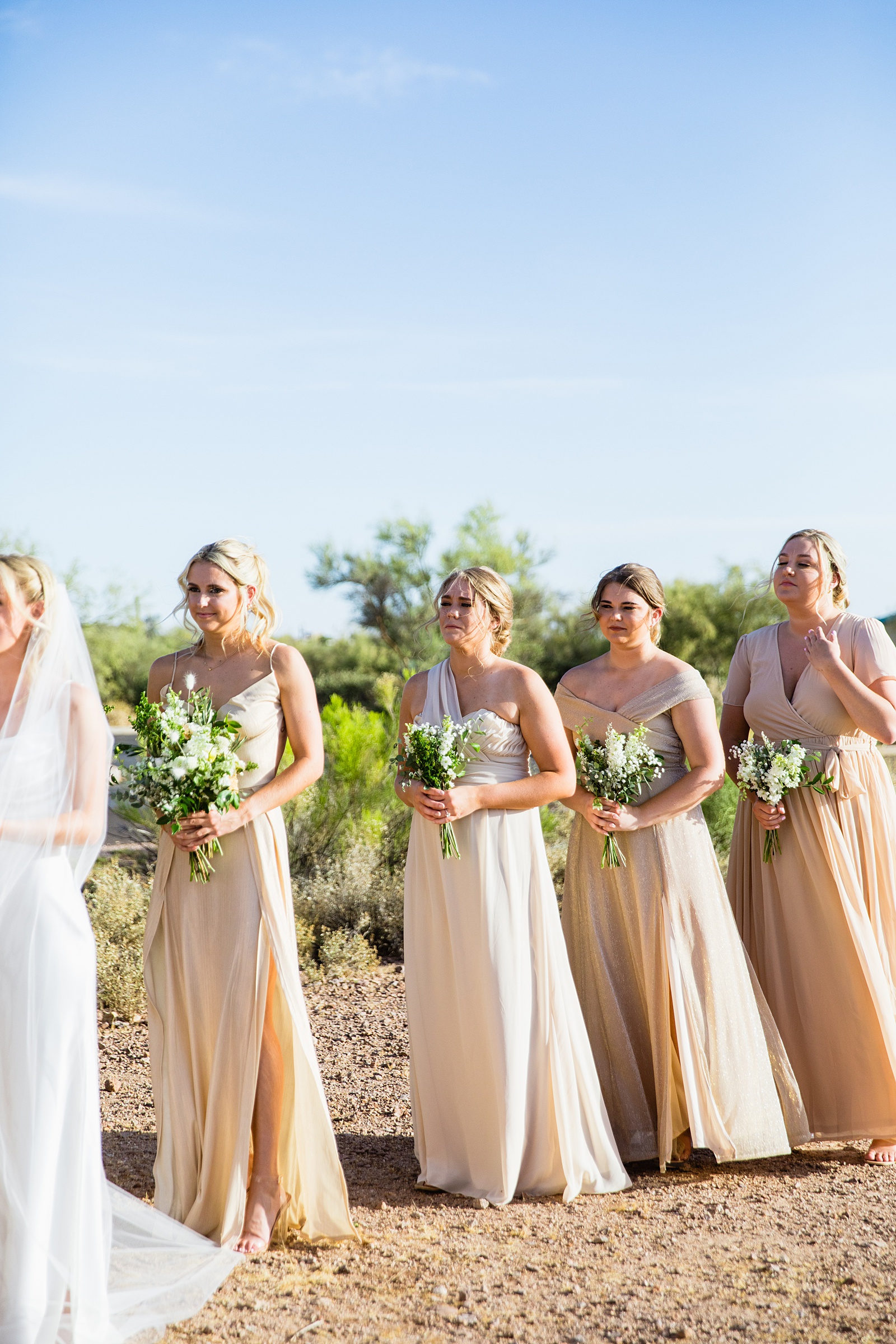 Bridesmaids during Superstition Mountain Micro wedding ceremony by Phoenix wedding photographer PMA Photography.