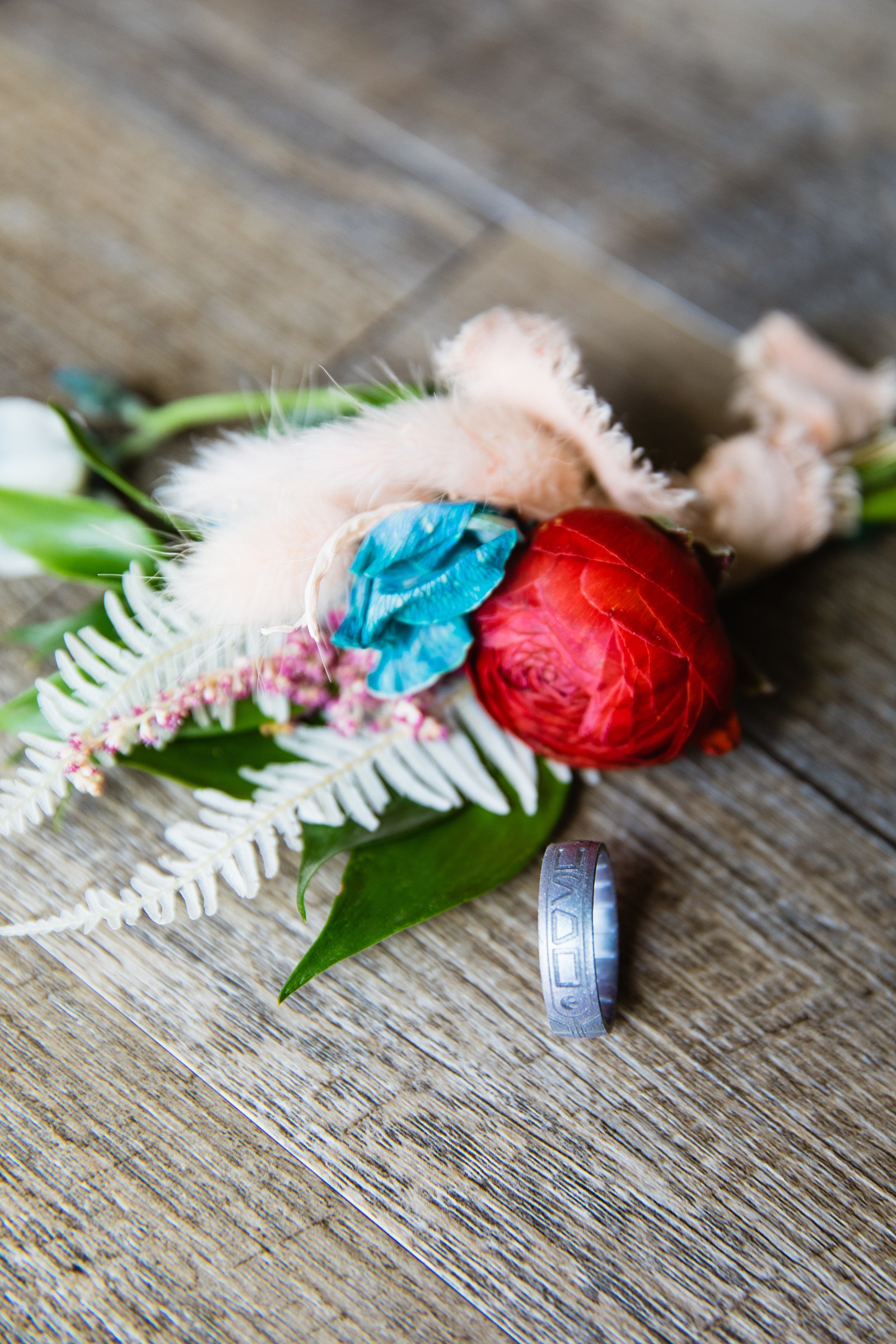 Groom's wedding day details of boutonniere and Star Wars wedding ring by PMA Photography.