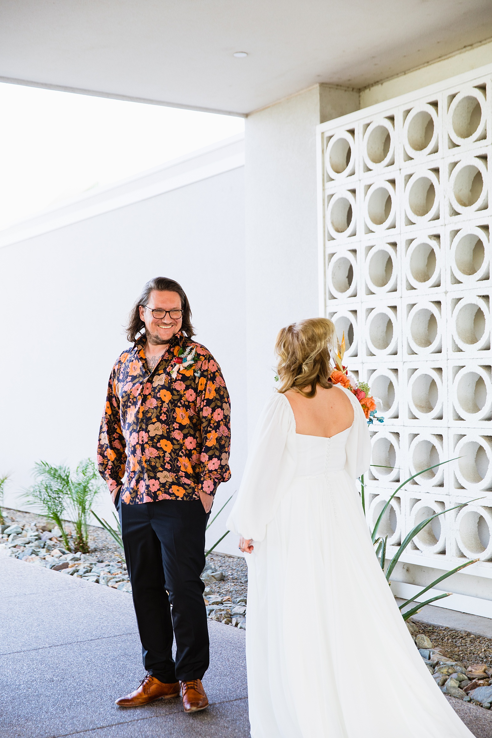Bride and groom's first look at Mountain Shadows Resort by Phoenix wedding photographer PMA Photography.