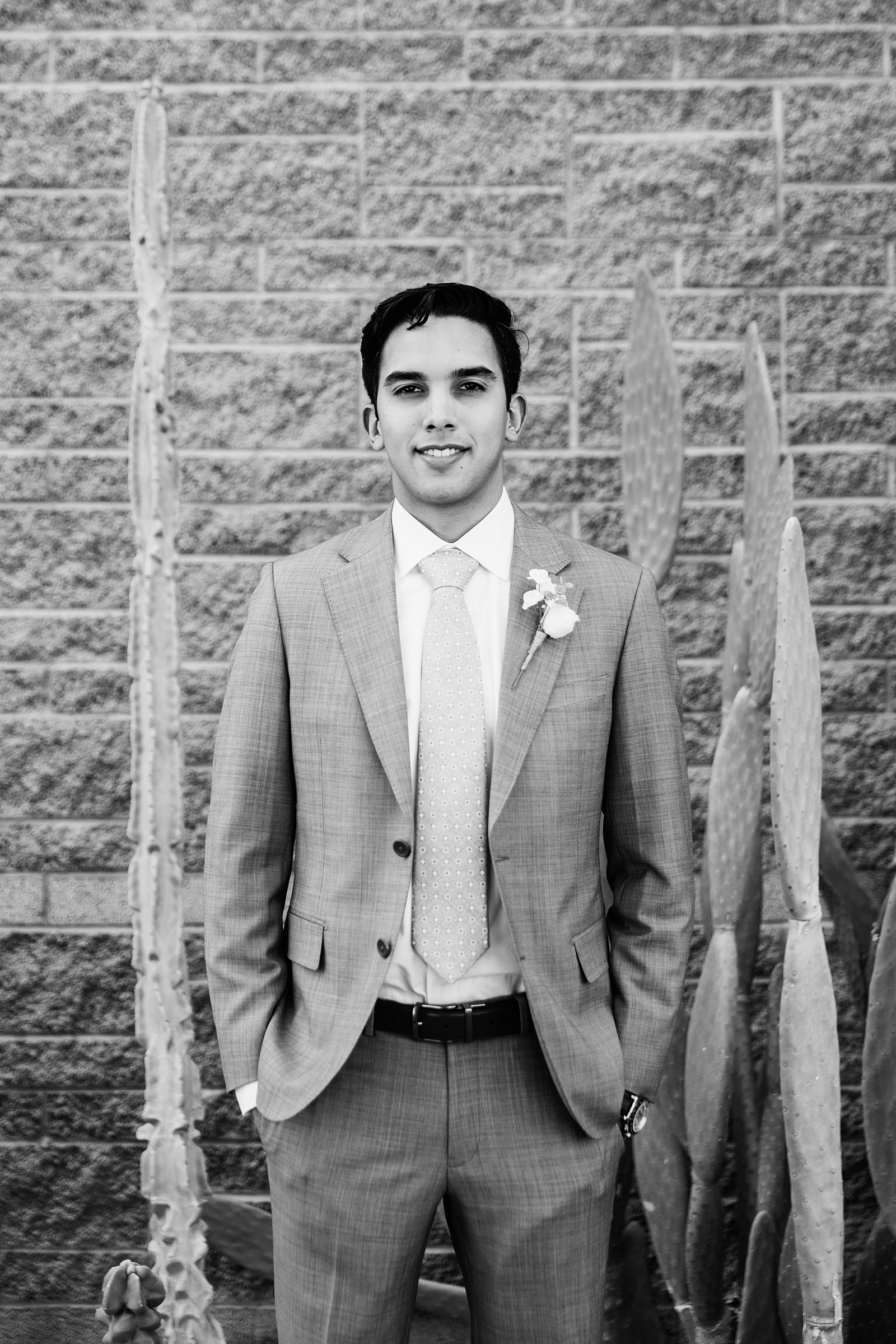 Groom's classic grey suit for his Hyatt Regency Scottsdale Resort & Spa At Gainey Ranch wedding by PMA Photography.