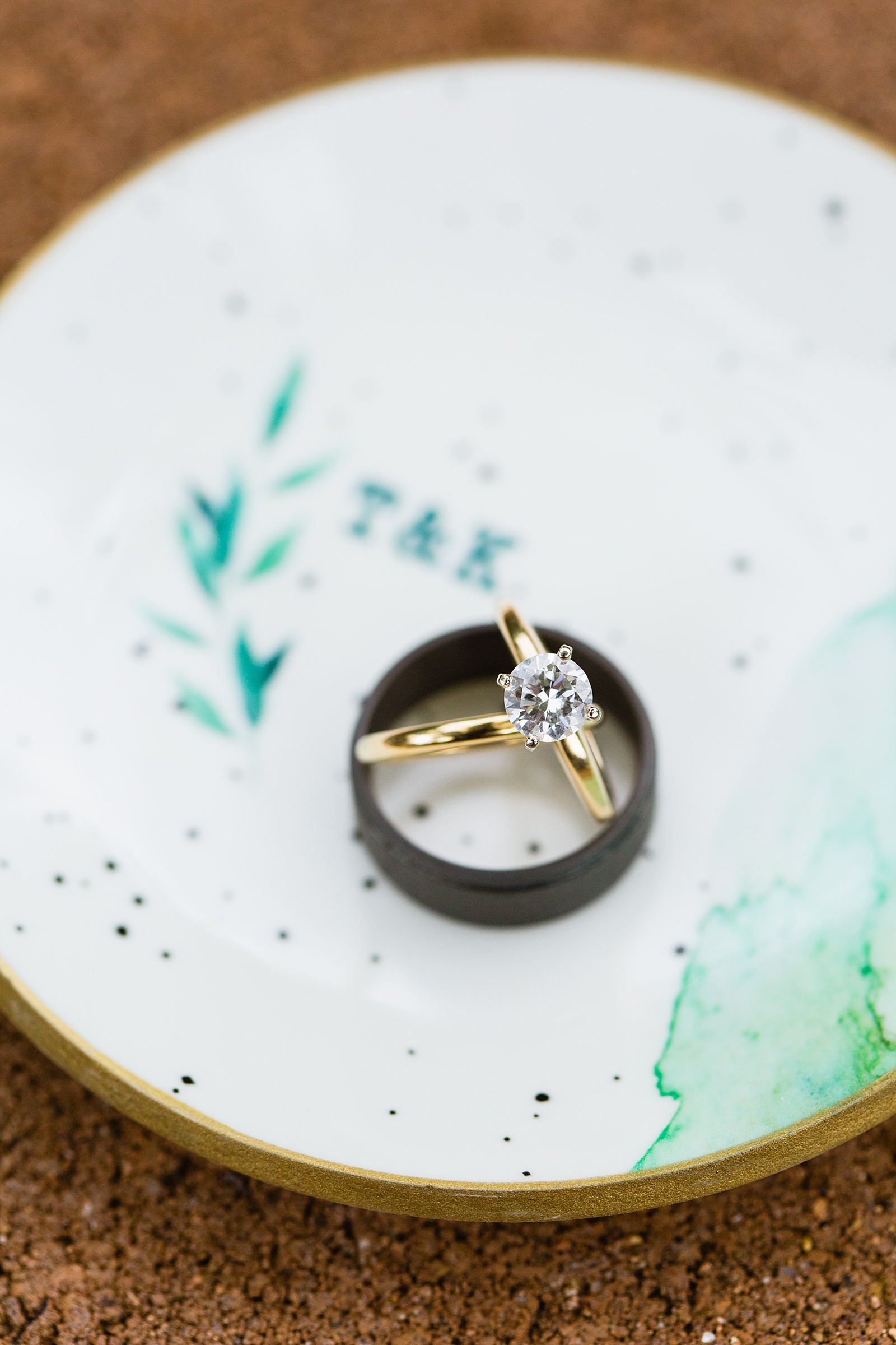 Bride's wedding day details of wedding bands by PMA Photography.