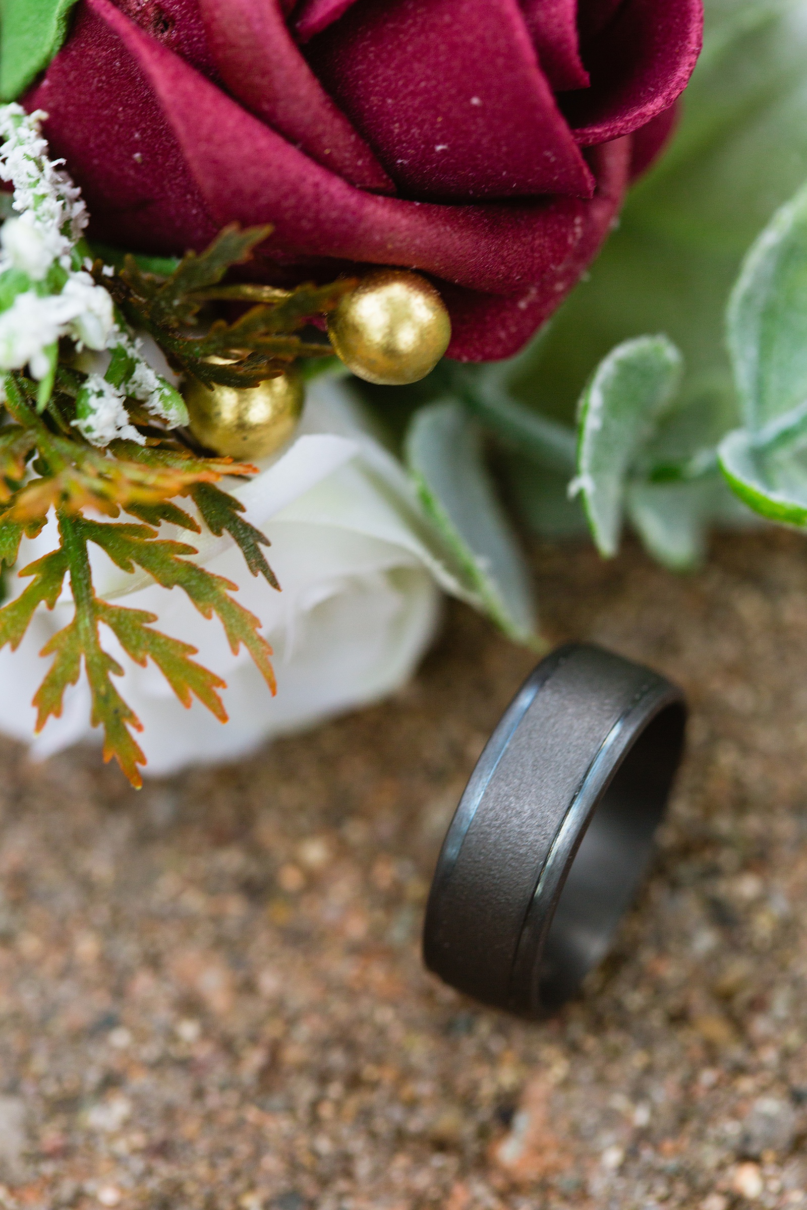 Groom's wedding day details of all black wedding band by PMA Photography.