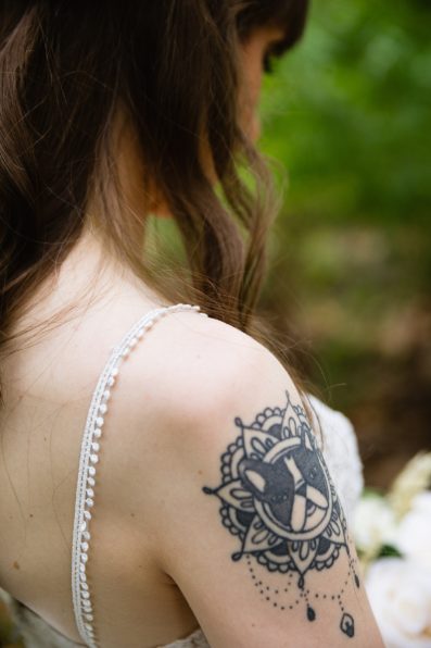 Bride's wedding day details of tattoo by PMA Photography