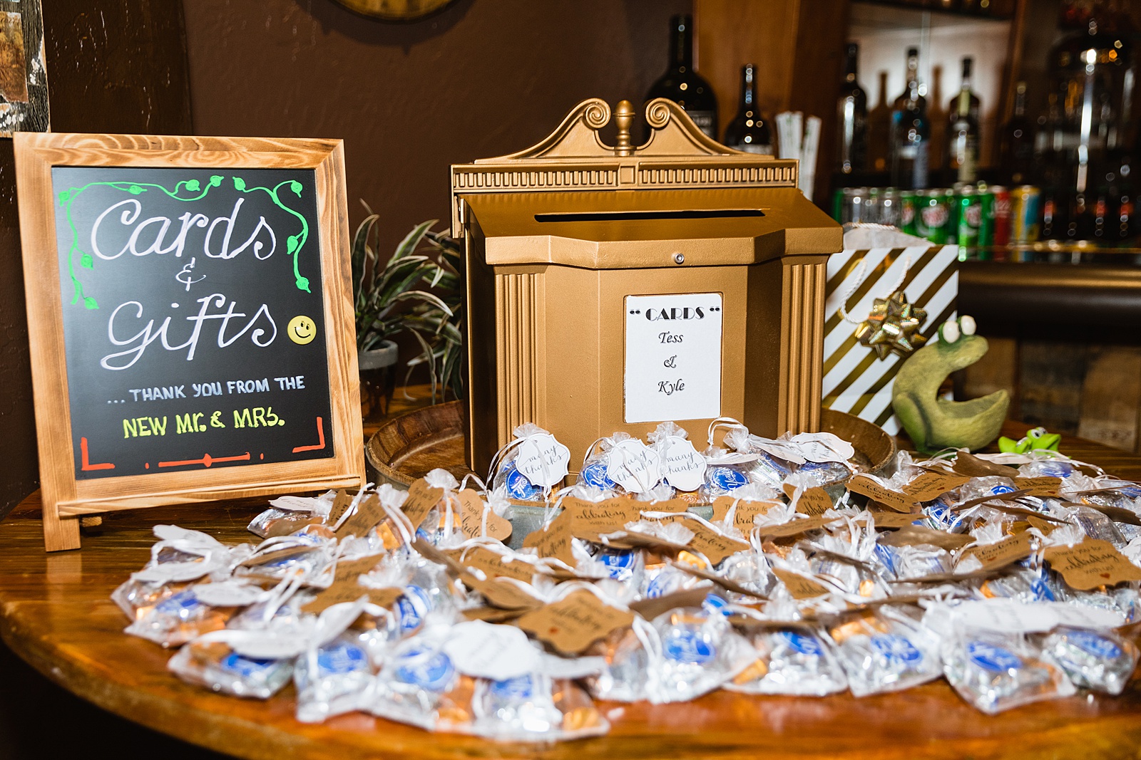 Vintage inspired gift table at Timo Wood Oven Wine Bar wedding reception by Sedona wedding photographer PMA Photography.