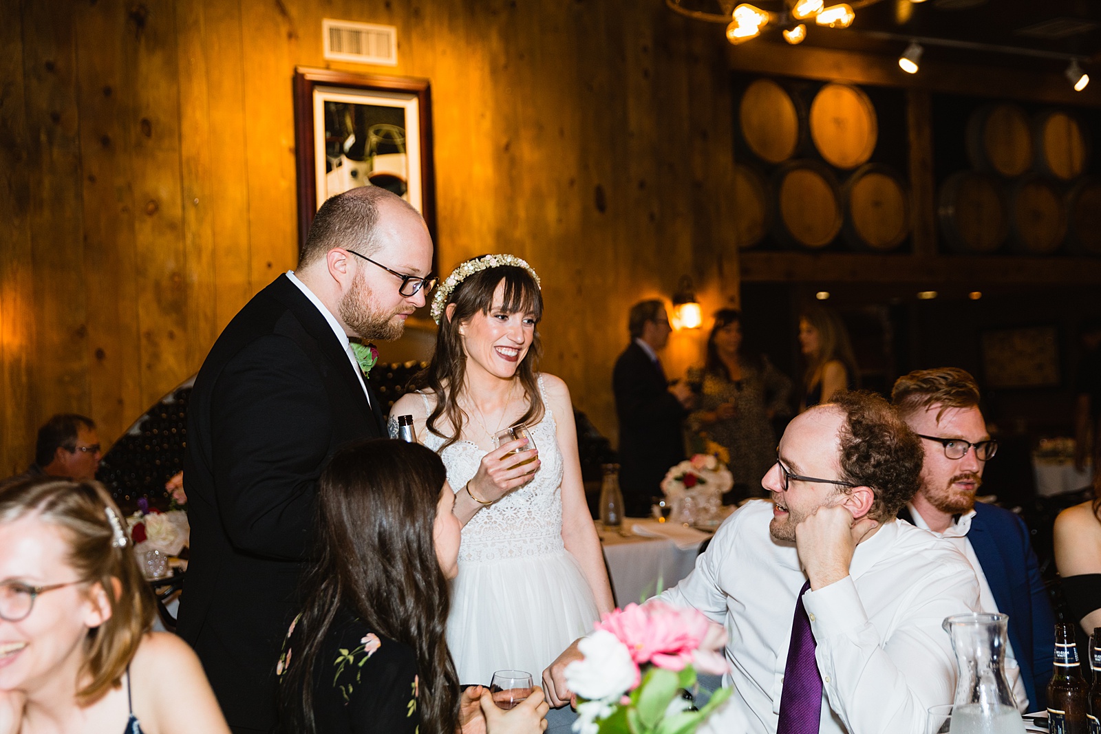 Bride and Groom with guests at Timo Wood Oven Wine Bar wedding reception by Sedona wedding photographer PMA Photography