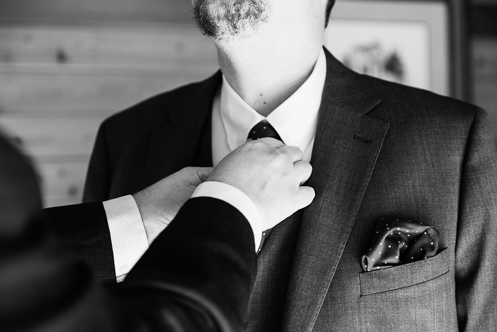 Groom getting ready for his elopement by Arizona elopement photographers PMA Photography.
