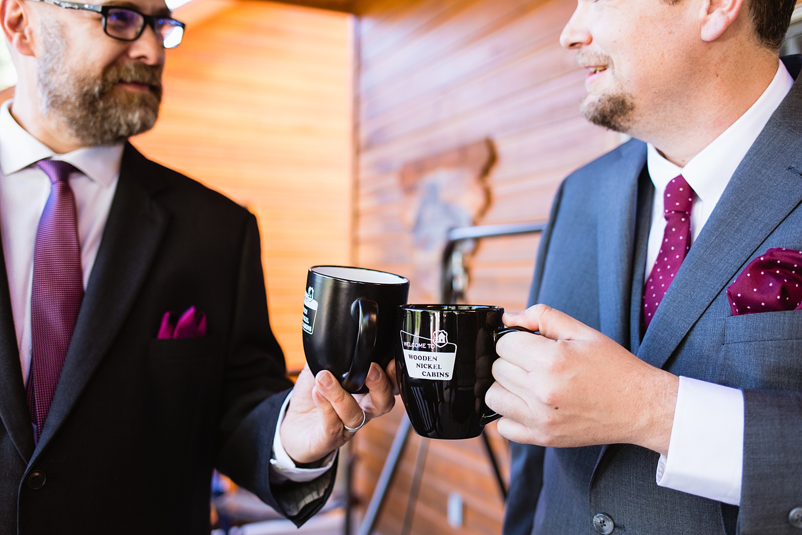 Groom shares a toast before his elopement by Arizona elopement photographers PMA Photography.