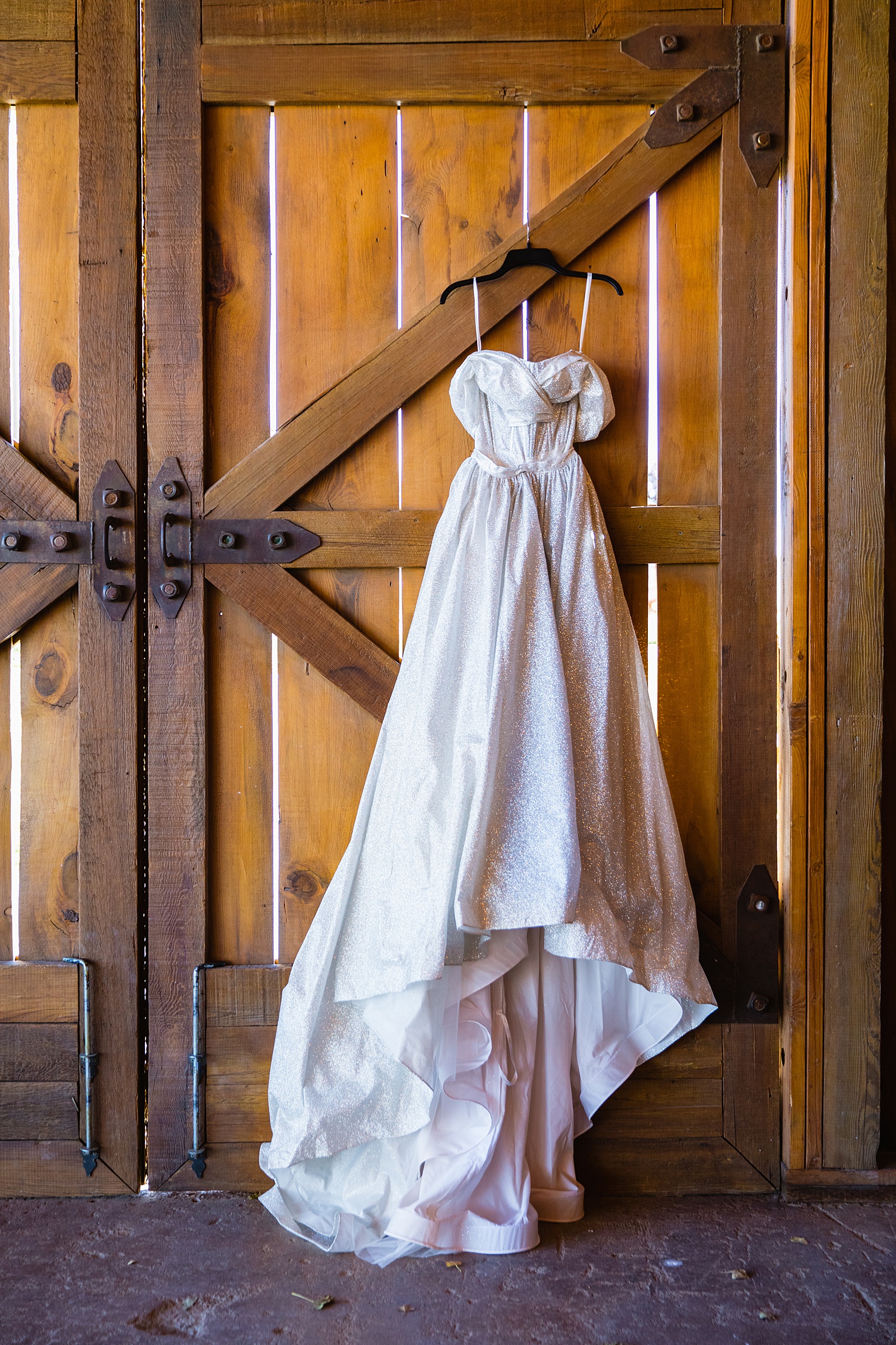 Brides's wedding day details of Cinderella inspired wedding dress by PMA Photography.