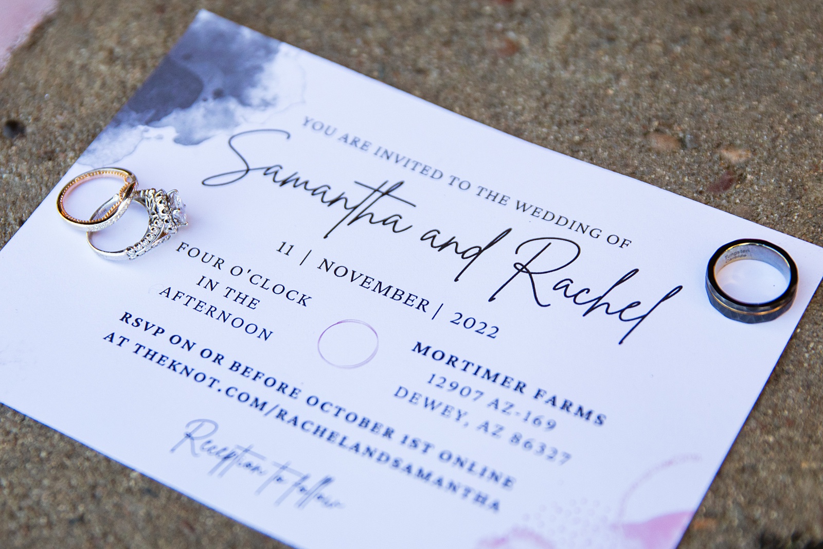 Brides's wedding day details of watercolor wedding invitation and wedding rings by PMA Photography.