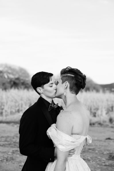 Same sex couple's first look at Mortimer Farms by Arizona wedding photographer PMA Photography.