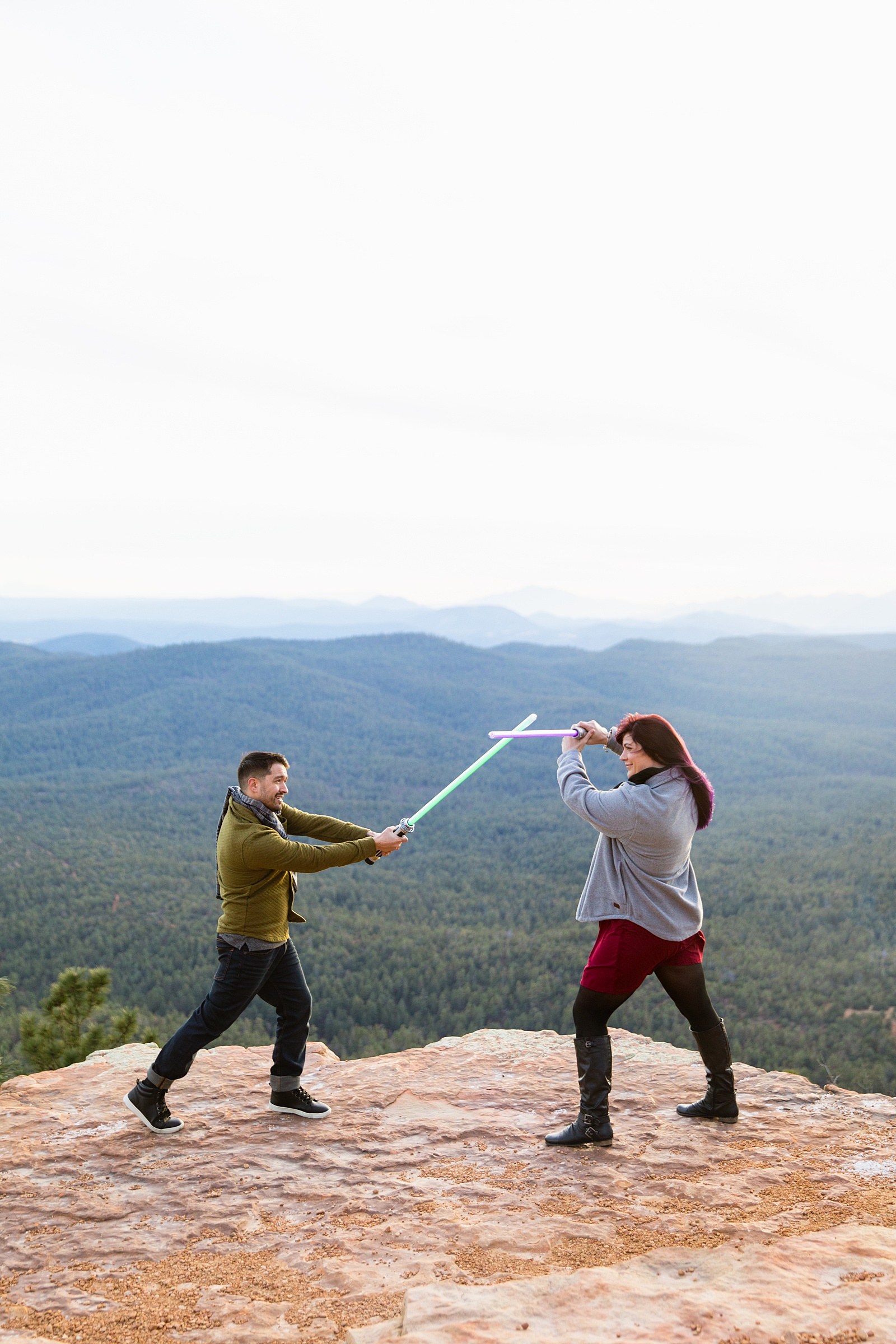 Star Wars inspired couple pose during their Payson engagement session by Arizona wedding photographer PMA Photography.