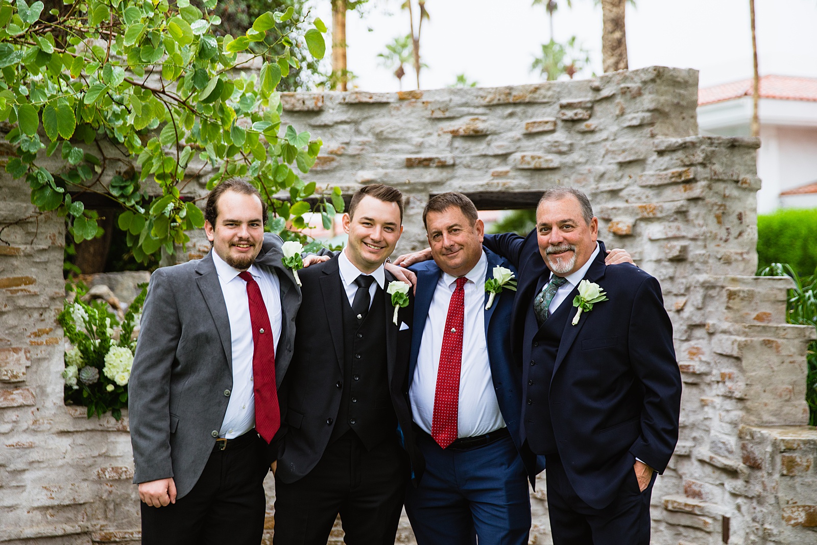 Groom and groomsmen together at a The Scott wedding by Arizona wedding photographer PMA Photography.