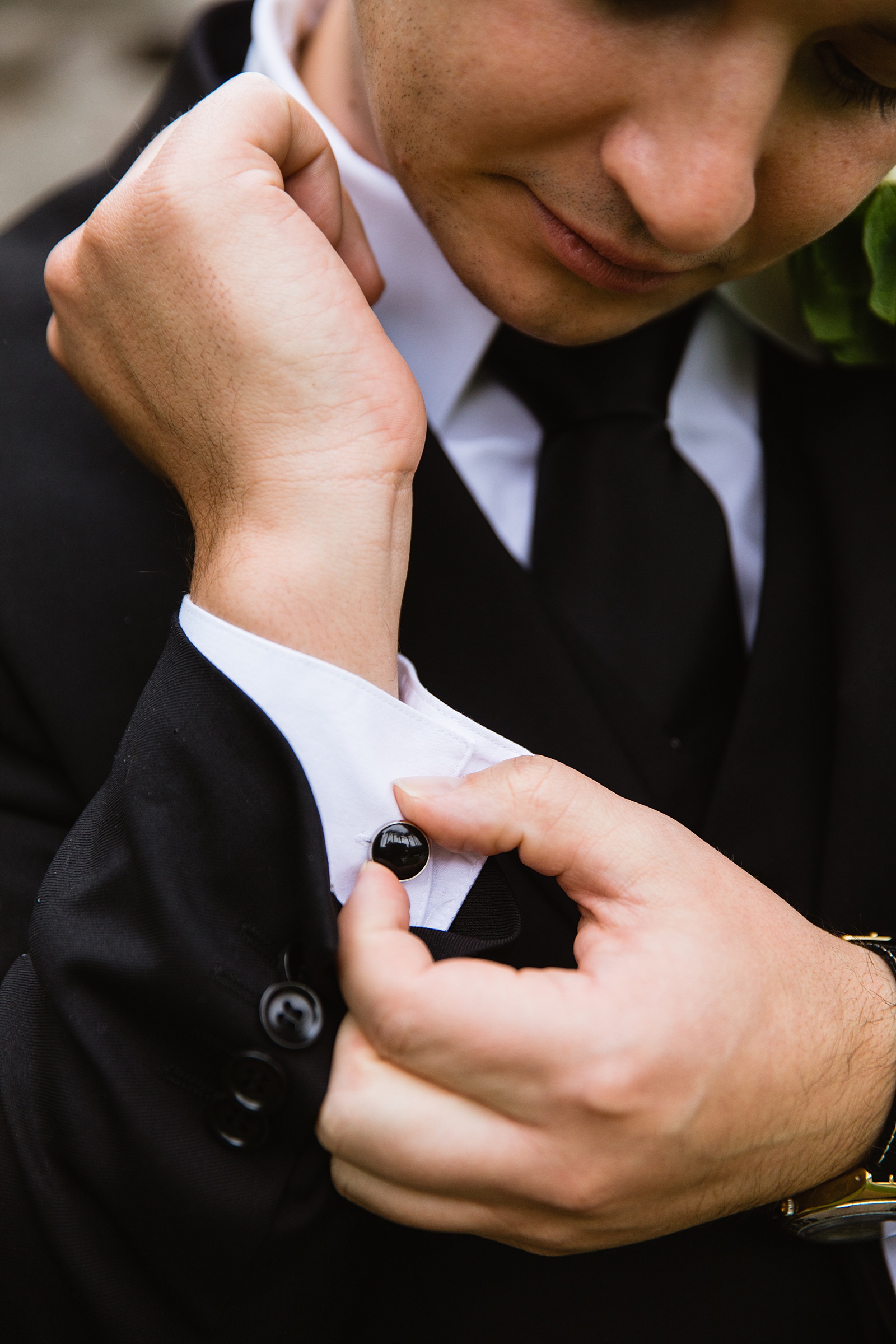 Groom's wedding day details of cuff links by PMA Photography.