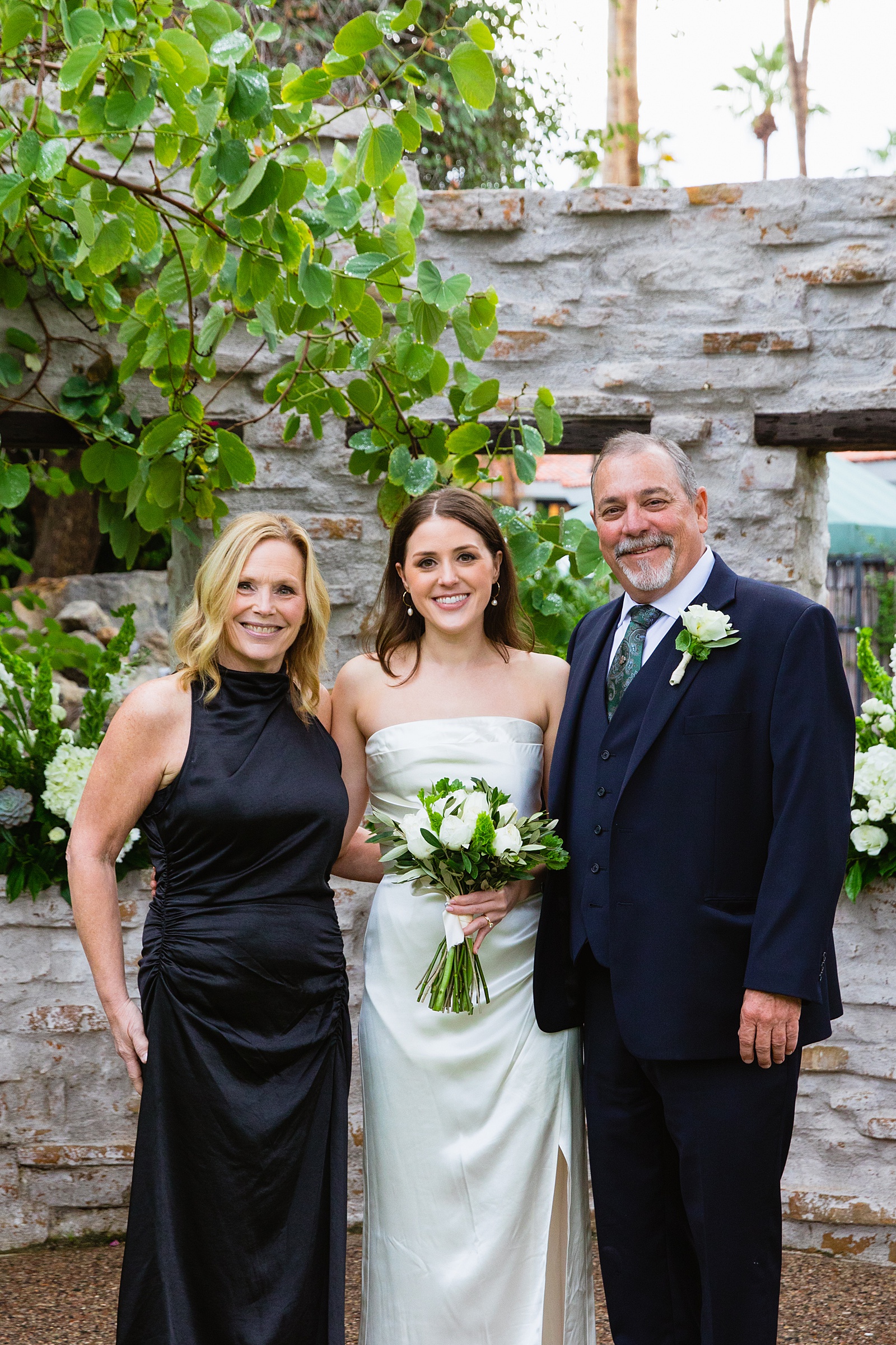 Bride and her parents together at a The Scott wedding by Arizona wedding photographer PMA Photography.