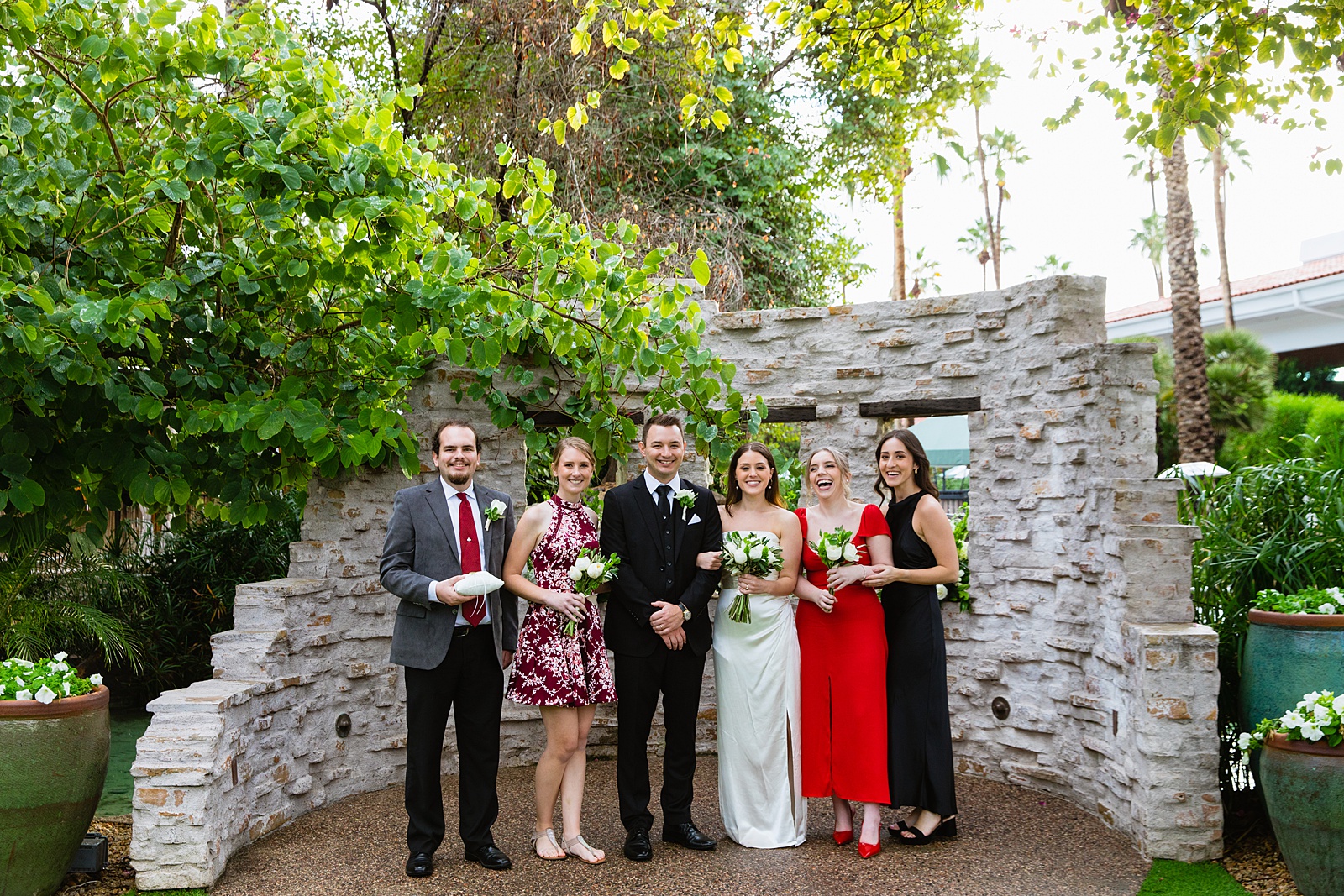 Groom with guests at The Scott wedding by Scottsdale wedding photographer PMA Photography