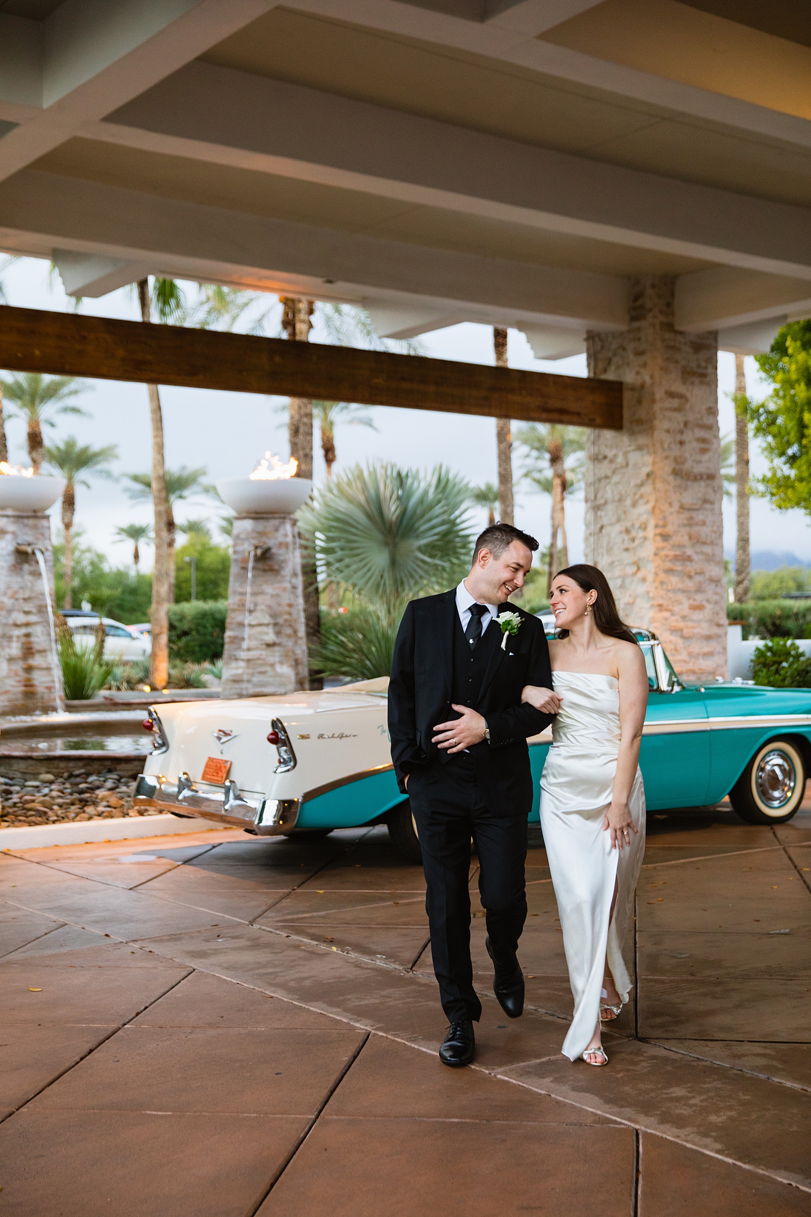 Bride & Groom pose for their The Scott wedding by Scottsdale wedding photographer PMA Photography.