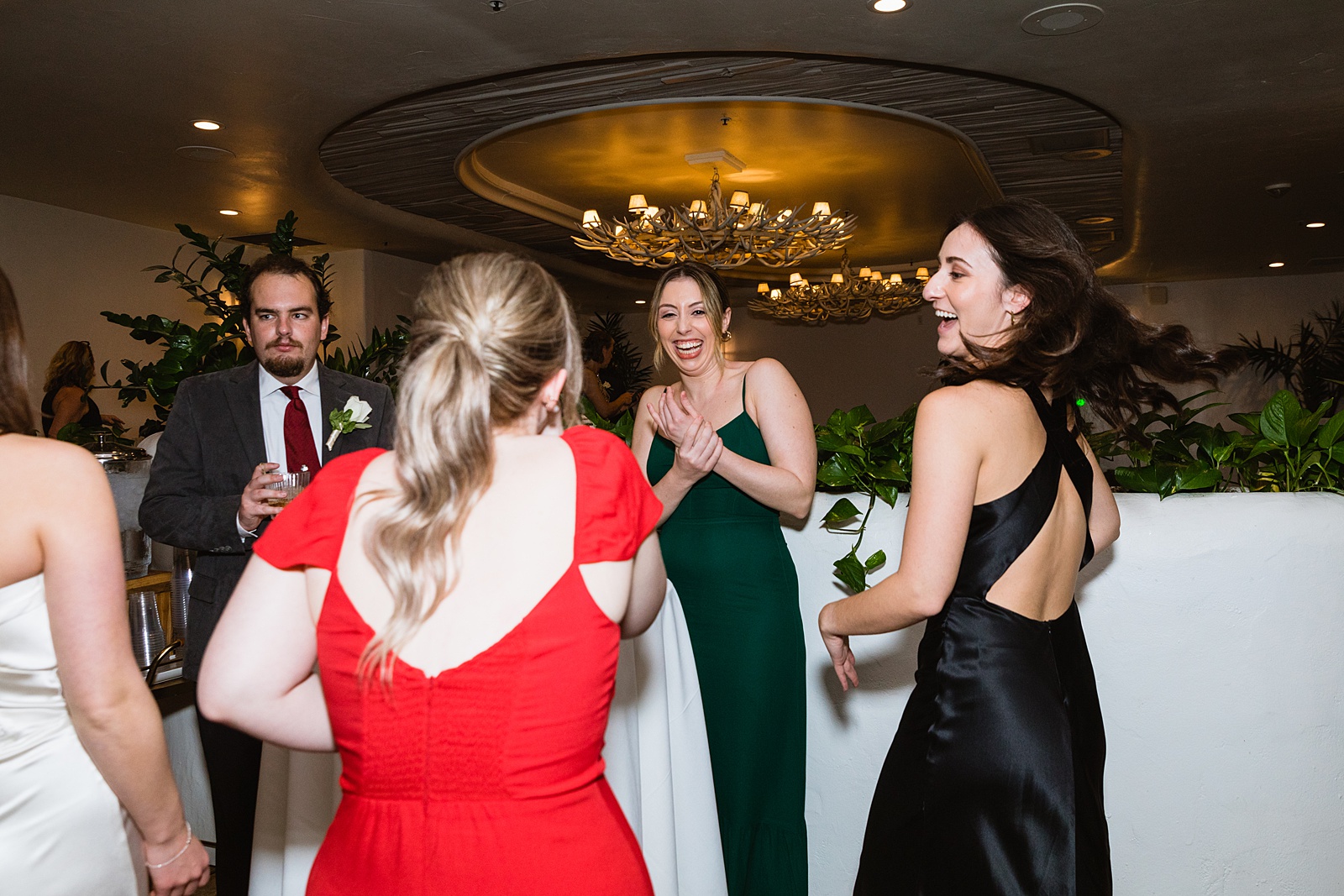 Guests together at The Scott wedding reception by Scottsdale wedding photographer PMA Photography