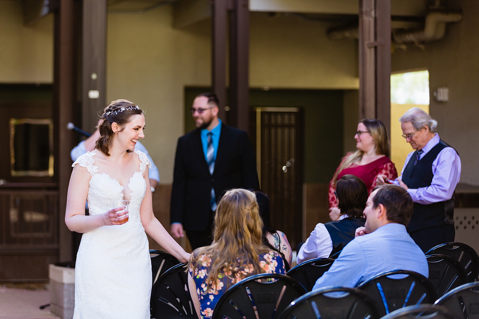 Bride and groom with guests at their Chandler Community Center Wedding by PMA Photography.