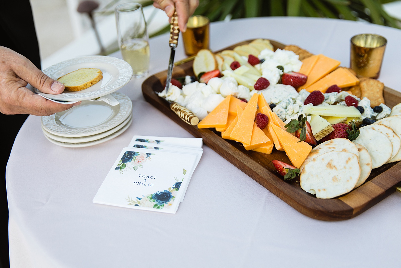 Charcuterie served at backyard wedding reception at a private backyard by Phoenix wedding photographer PMA Photography.