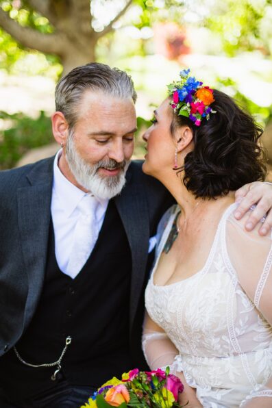 Bride and groom share an intimate moment during their first look at Japanese Friendship Garden by Phoenix wedding photographer PMA Photography.