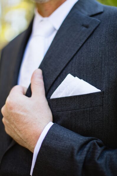 Groom's wedding day details of his pocket square by PMA Photography.