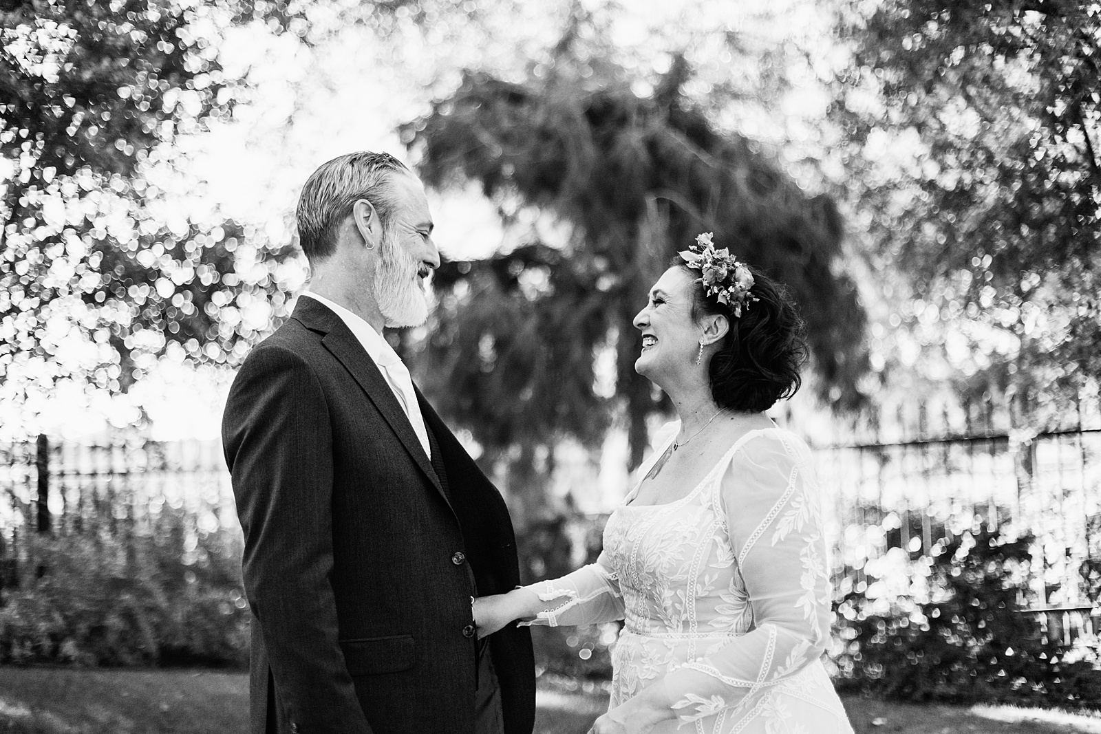 Bride and groom's first look at Japanese Friendship Garden by Phoenix wedding photographer PMA Photography.