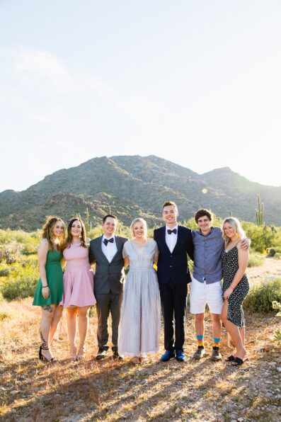 Family portraits at White Tanks wedding ceremony by Arizona elopement photographer PMA Photography.