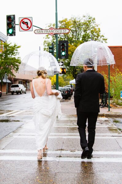 Rainy day elopement in downtown Flagstaff by Arizona elopement photographer PMA Photography.