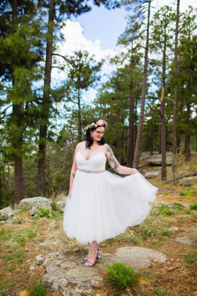 Bride's boho wedding dress for her Mogollon Rim elopement by PMA Photography.