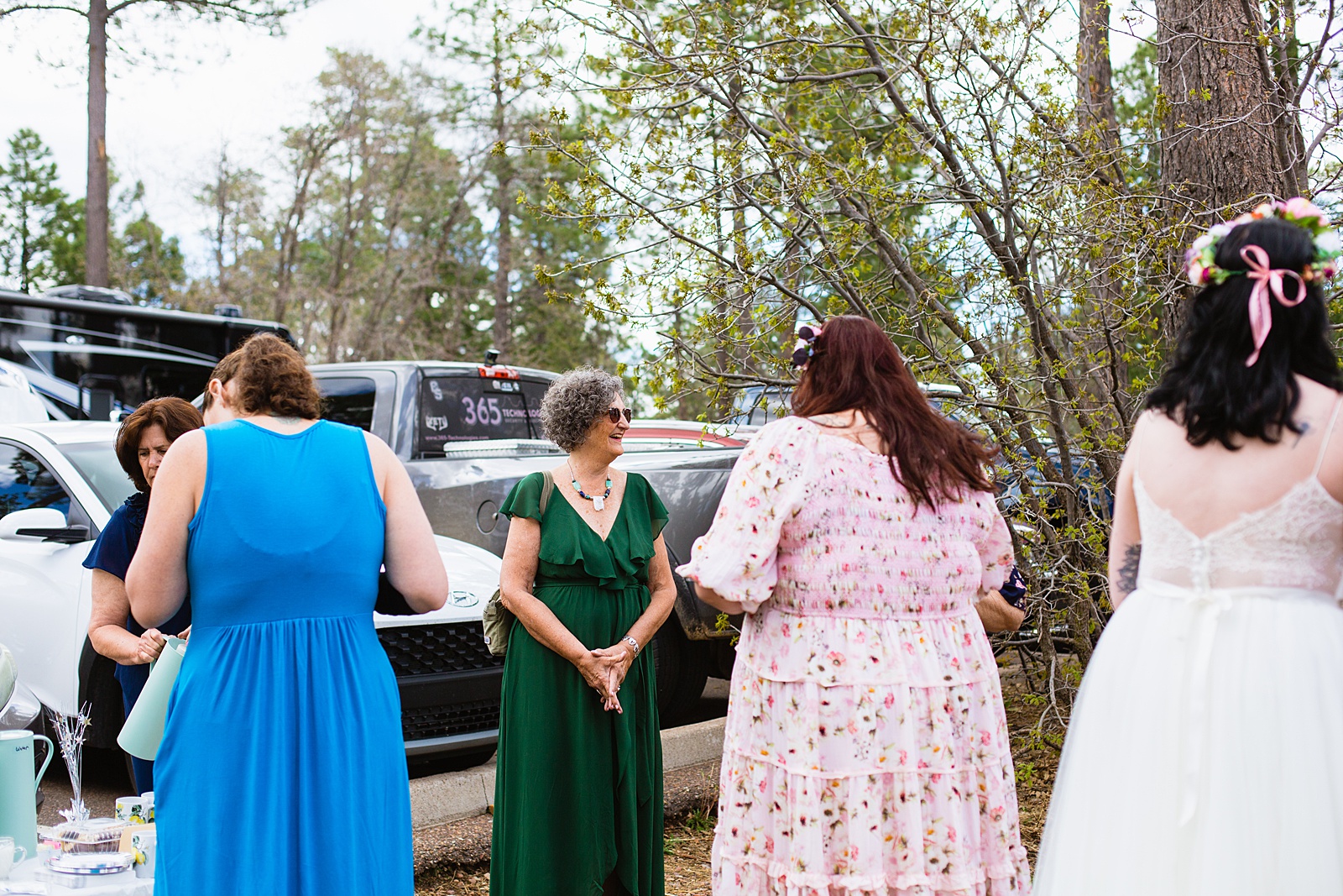 Family at Mogollon Rim wedding ceremony by Arizona elopement photographer PMA Photography.