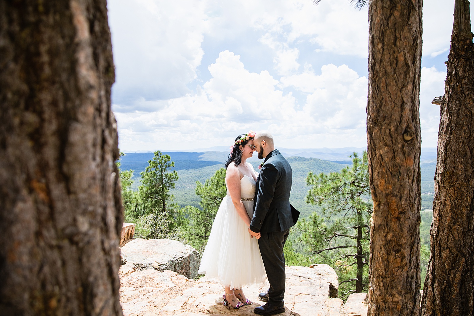 Bride & Groom share an intimate moment at their Mogollon Rim elopement by Arizona elopement photographer PMA Photography.